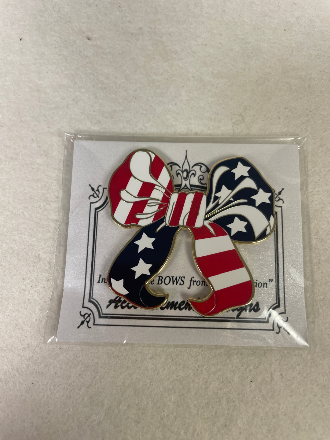 Accoutrement Designs- Red, White and Blue Bow Needleminder