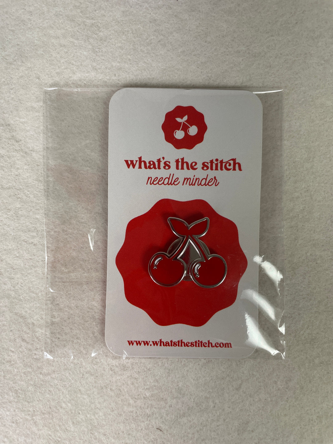 * What's the Stitch Needlepoint / Cherry Needleminder