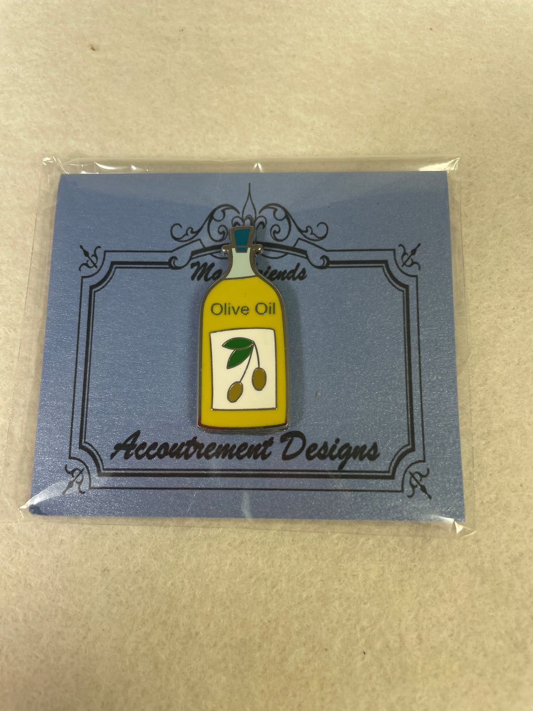 Accoutrement Designs- Olive Oil Needleminder