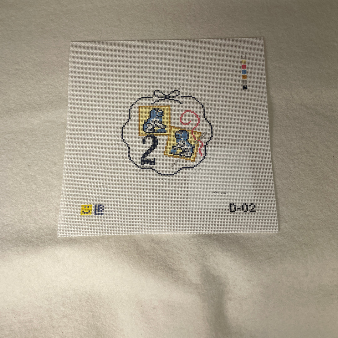 * Lauren Bloch  D02- 12 Days of Needlepoint- Two Foo Dog Needle Minders
