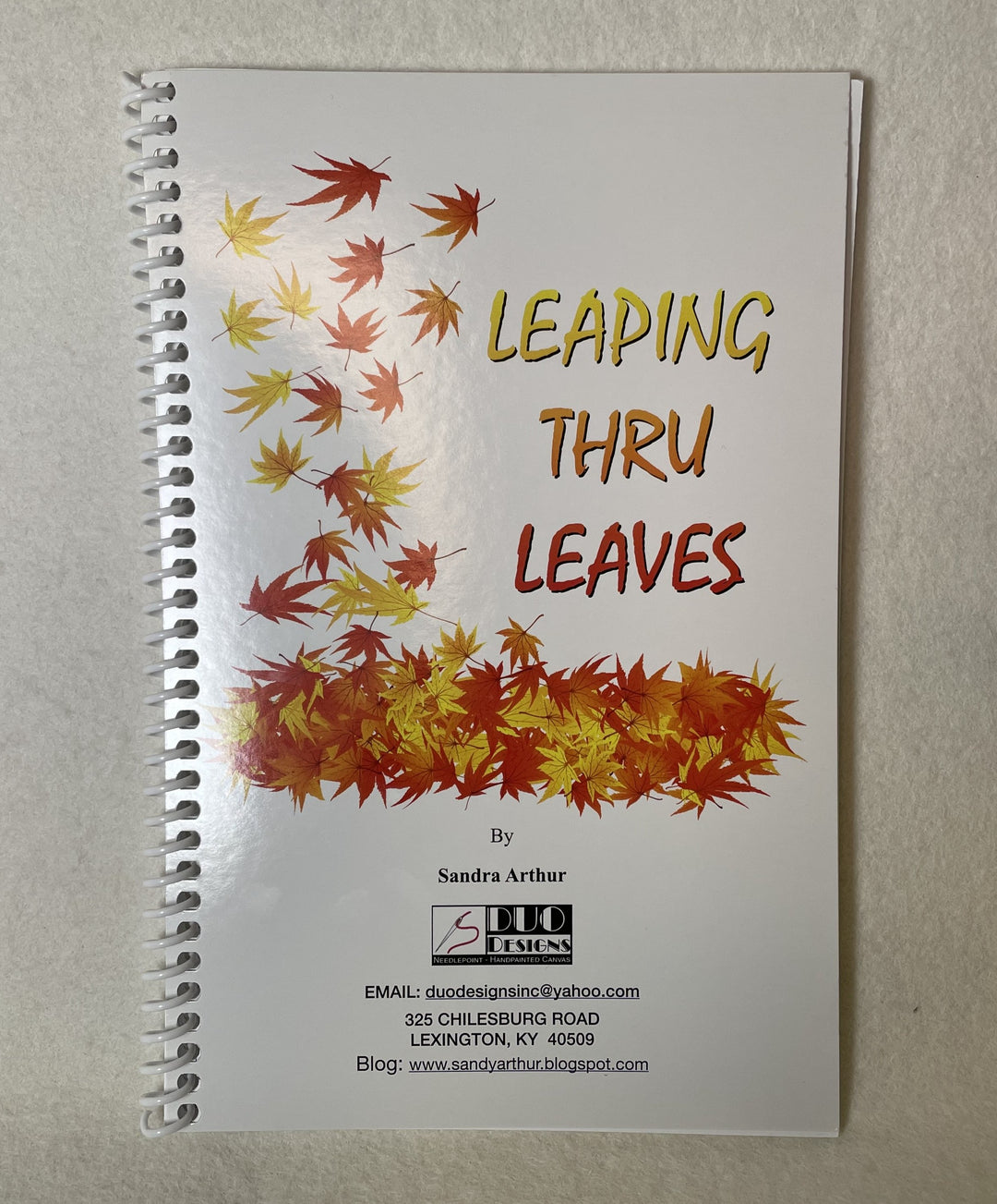 Leaping Through Leaves by Sandra Arthur
